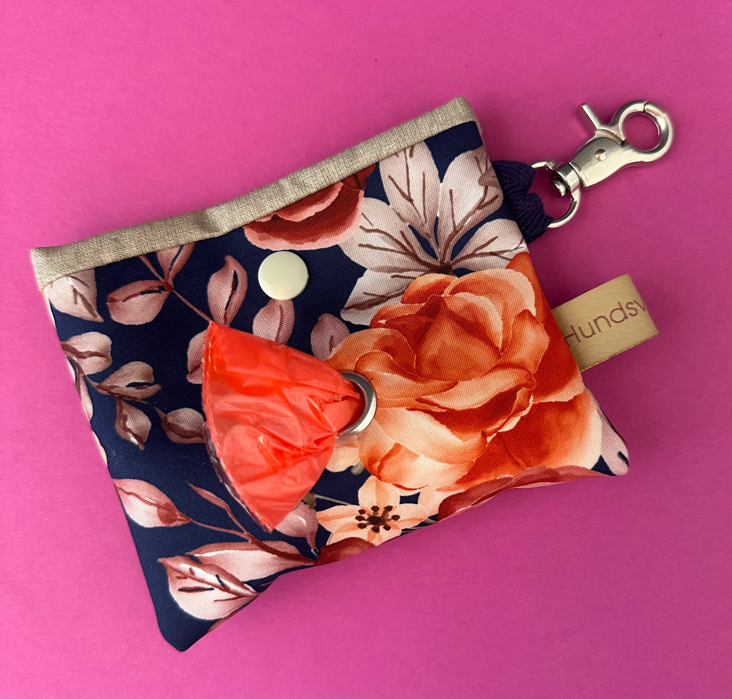 Sofortkauf | Kotbeutelspender orange Blüten dunkelblau